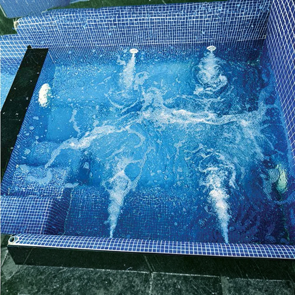 Hydro spa nozzles built into a pool wall